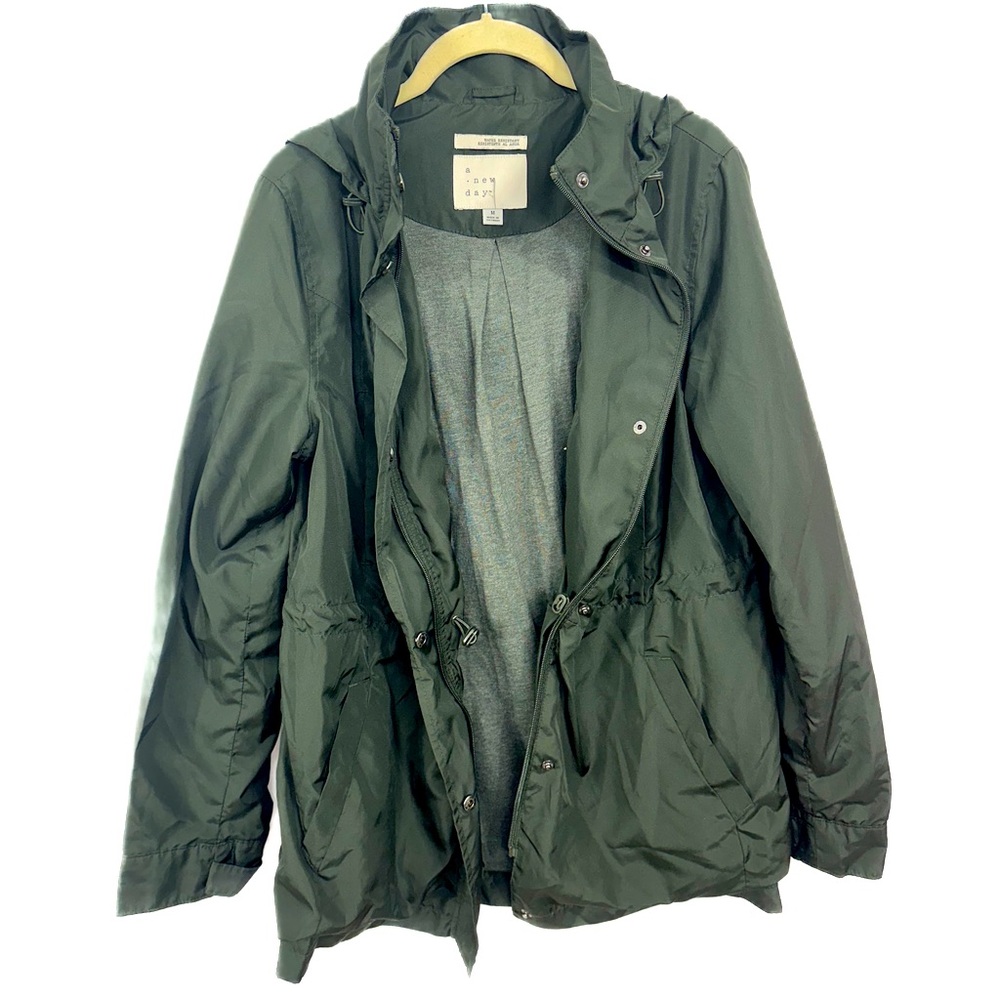 A new day green jacket. Lightly worn like new.
